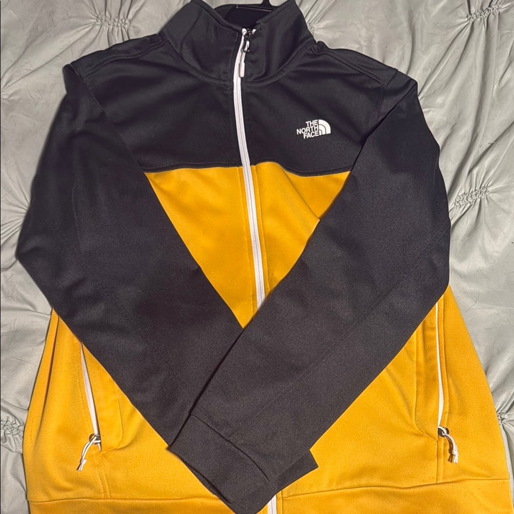 The North Face Black and Gold Jacket